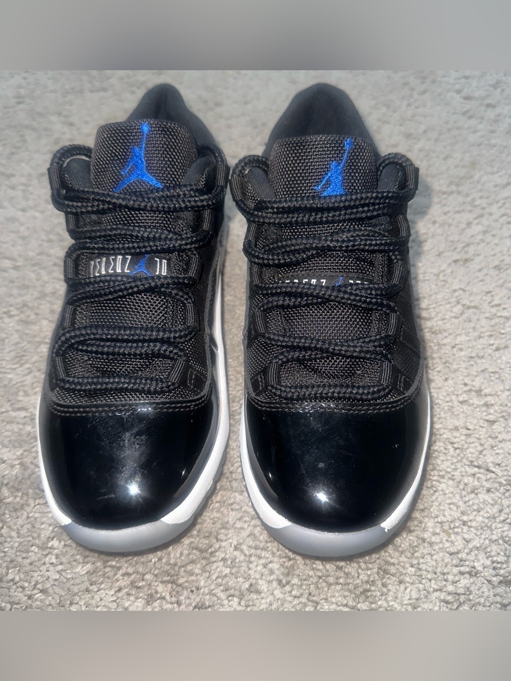 Jordan 11 Space Jam Low Too Kids Black with Blue Jumpman Low-Top Sneakers